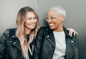 A smiling Lesbian couple